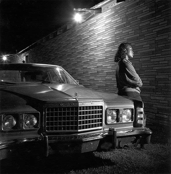 Jeanetta Davis leaning on car, Slim